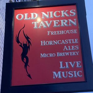 A pub sign for Old Nick's Tavern